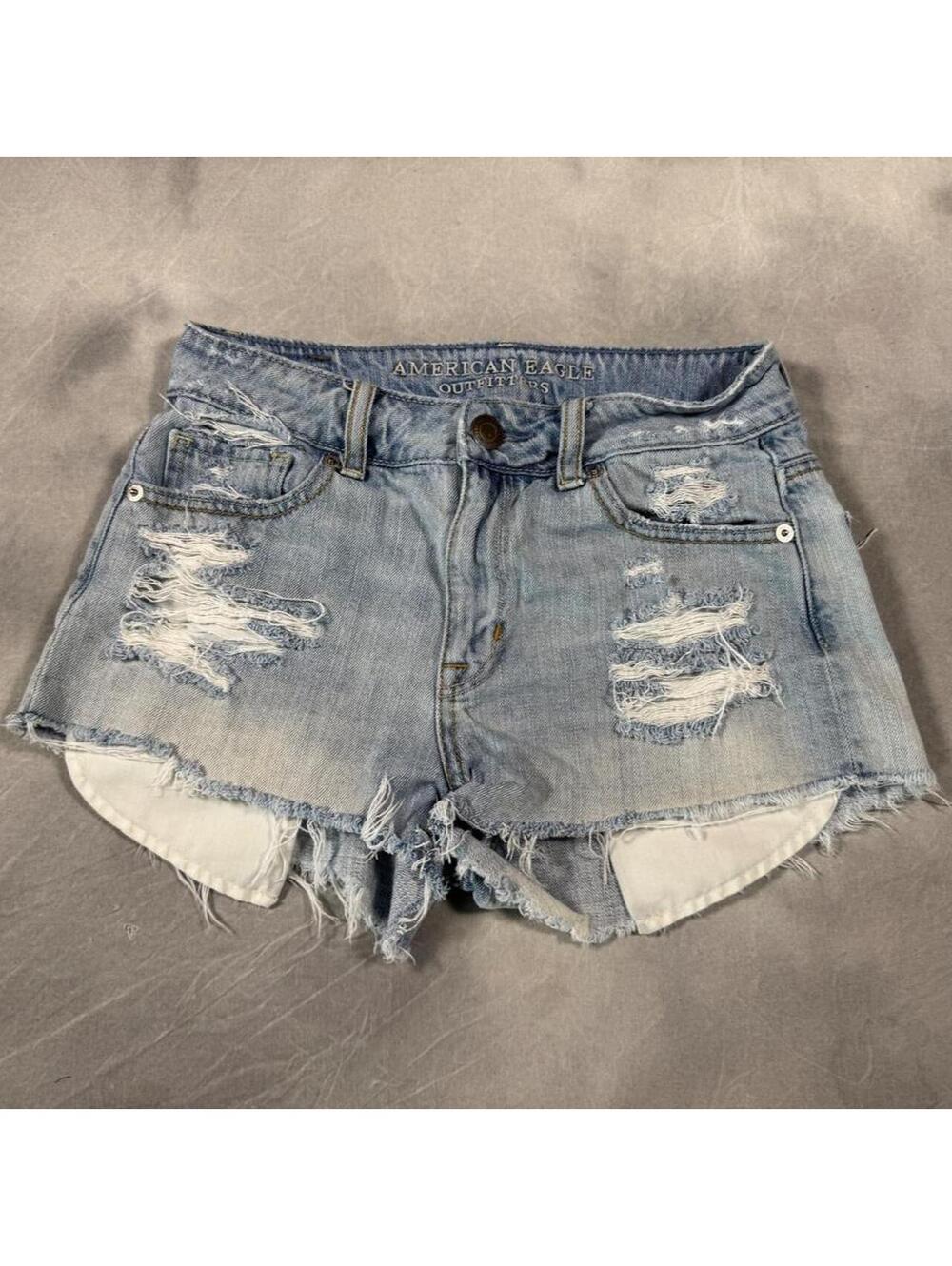 American Eagle Size 0 Distressed Denim Cutoff Shorts Light Wash Raw Hem Festival
